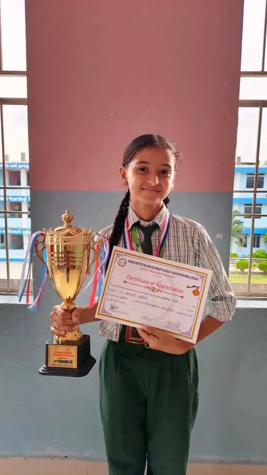 Rishika Khatri of Grade 7 for securing 3rd Position 🥉 in the Speech Competition held on 2083/05/11, organized by HISSAN Sunsari.